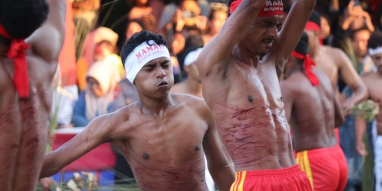 Sapu Lidi Whipping Ritual